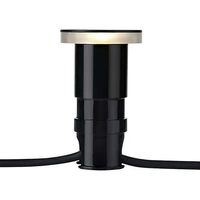 Garden 24 LED-EinbauspotWarmweiß, Schwarz - Nahaufnahme einer schwarzen LED-Gartenleuchte mit silberfarbenem Kopf, die auf dunklem Hintergrund ein sanftes Licht ausstrahlt.