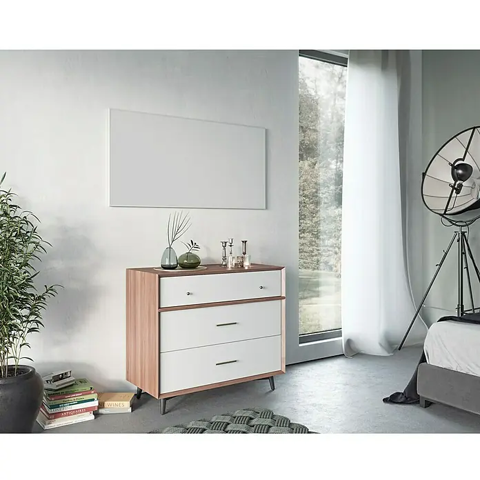 Ximax Infrarotheizkörper - 600 x 600 mm, 400 W, Wandmontage - Eine moderne Kommode in Holz- und Weißtönen mit drei Schubladen, ideal für stilvolle Aufbewahrung im Schlafzimmer oder Wohnbereich.