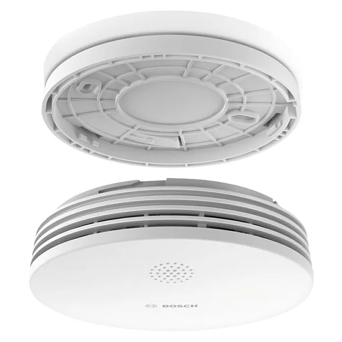 Bosch Smart Home Rauchwarnmelder II - Alarmsignal: 85 dB - Weißer Bosch Smart Home Rauchmelder mit offener und geschlossener Hälfte vor schwarzem Hintergrund.