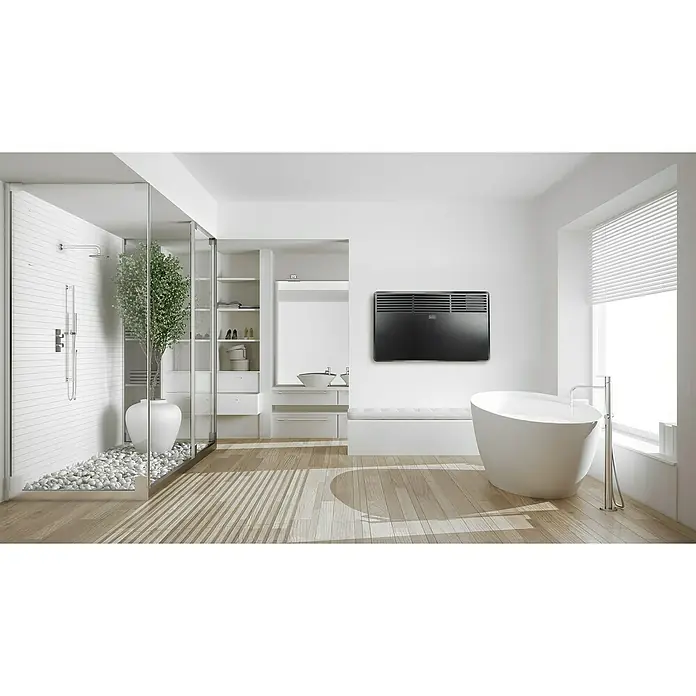 Black+Decker Konvektorheizung BXCSH1200E - 1.200 W, Raumgröße bis ca. 12 m², Schwarz - Dieses Badezimmer zeigt einen eleganten schwarzen Wandheizkörper vor einer Badewanne und einer begehbaren Dusche.