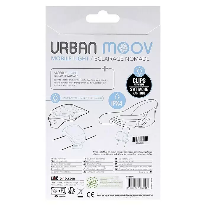 T'nB Linterna para bicicletas - Blanco - Embalaje blanco para una luz de bicicleta LED móvil 'Urban Moov', destacando su función de clip y 12 lúmenes.