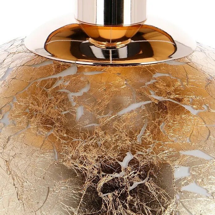 Tween Light Tischleuchte Gala - 40 W, Schwarz/Gold, G9 - Nahaufnahme einer goldenen Lampe mit einzigartiger Textur und elegantem Design.