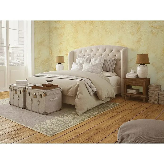 Osaka Pintura para efectos decorativos Arena - 5 l, Crema, Mate - Acogedora habitación con una cama elegante, mesita de noche y toques decorativos para un ambiente relajante.