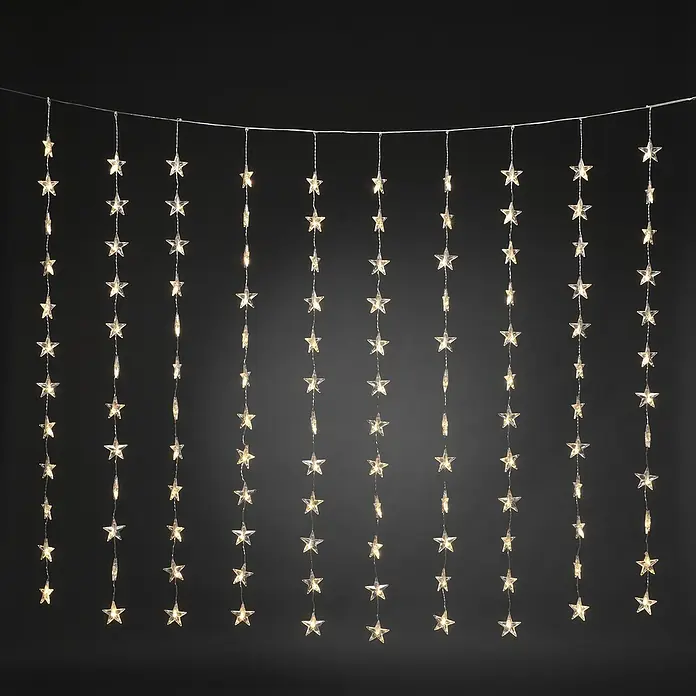 Konstsmide LED-Lichtervorhang Sterne - B x H: 140 x 120 cm, Innen, Kunststoff, Warmweiß - Eine dekorative Lichterkette mit Sternen, die an einer dünnen Schnur befestigt sind und warmes Licht ausstrahlen, ideal für festliche Dekorationen.