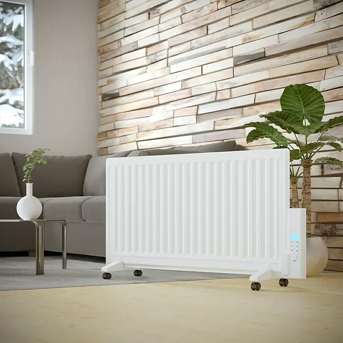 Voltomat HEATING Ölradiator - 1.000 W, Raumgröße bis ca. 10 m², Weiß - Ein weißer, tragbarer Heizkörper steht im Raum und sorgt für Wärme. Er hat Rollen und ein Display zur einfachen Bedienung.