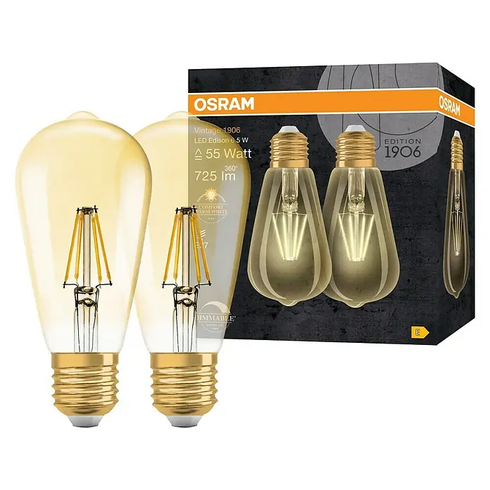 Osram LED-Lampen Set Vintage Edition 1906 Birnenform E27 2er Set - E27, Dimmbar, Warmweiß, 725 lm, 6,5 W - Eine Nahaufnahme von zwei Osram Vintage 1906 LED Edison Glühbirnen, die mit einer Produktverpackung präsentiert werden.