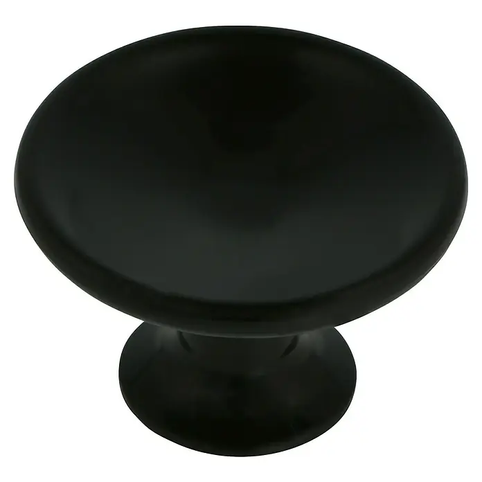 Häfele Pomo para muebles - Tipo de tirador del mueble: Botón, Ø x Al: 40 x 25 mm, Plástico, Negro - Primer plano de un pomo de mueble redondo negro, ideal para cajones o armarios, que combina estilo y funcionalidad.