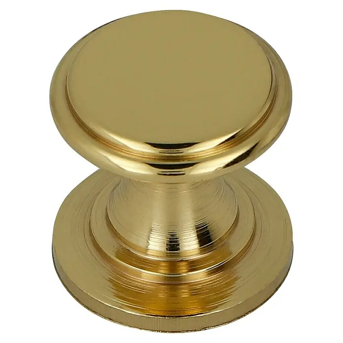 Häfele Pomo para muebles - Tipo de tirador del mueble: Botón, Ø x L: 14 x 13 mm - Primer plano de un tirador dorado para muebles. Un detalle chic para armarios y cajones, con elegancia y estilo.