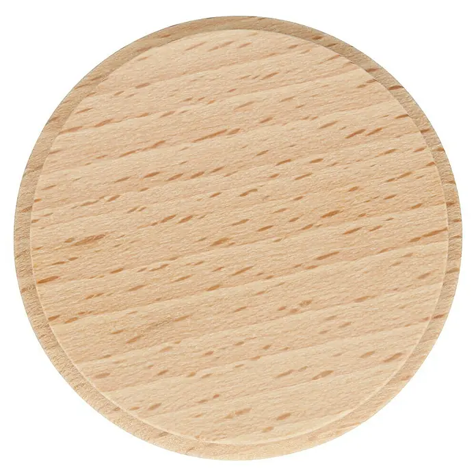 Häfele Tirador para muebles - Tipo de tirador del mueble: Concha, Madera, Ø x L: 60 x 11 mm - Primer plano de un disco de madera redondo con una superficie lisa y un sutil veteado, ideal para manualidades rústicas.