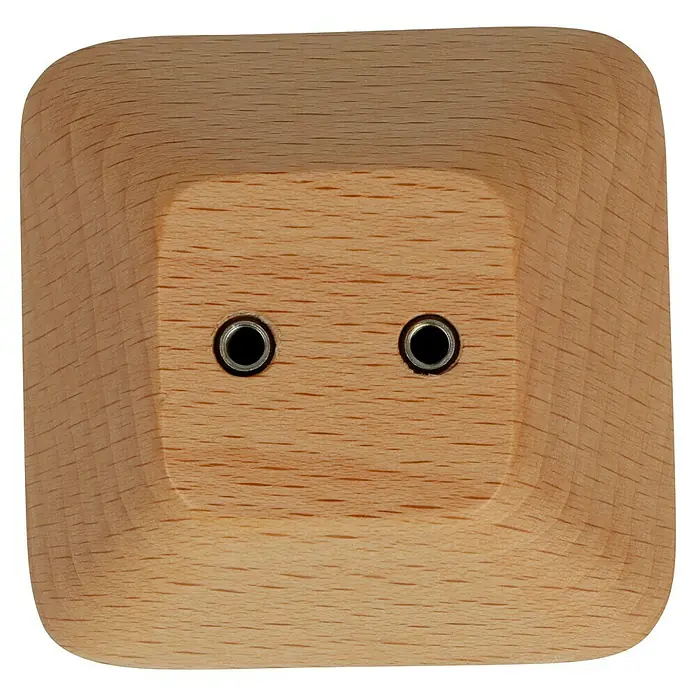 Häfele Pomo para muebles - Tipo de tirador del mueble: Botón, Madera, Lacado, An x Al: 26 x 58 mm - Primer plano de una toma de corriente de cubo de madera con dos orificios. La toma de corriente tiene bordes redondeados y un acabado liso de madera.