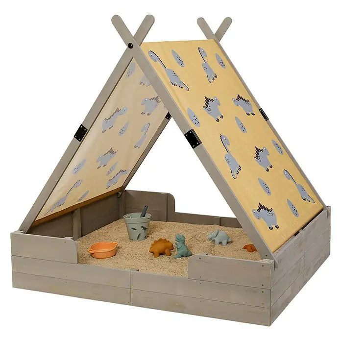 Muddy Buddy Sandkasten Dino Lover - 140 x 120 x 140 cm, Holz - Ein hellgrauer Sandkasten mit Dinosaurier-Muster-Abdeckung und Spielzeugen für Kinder.