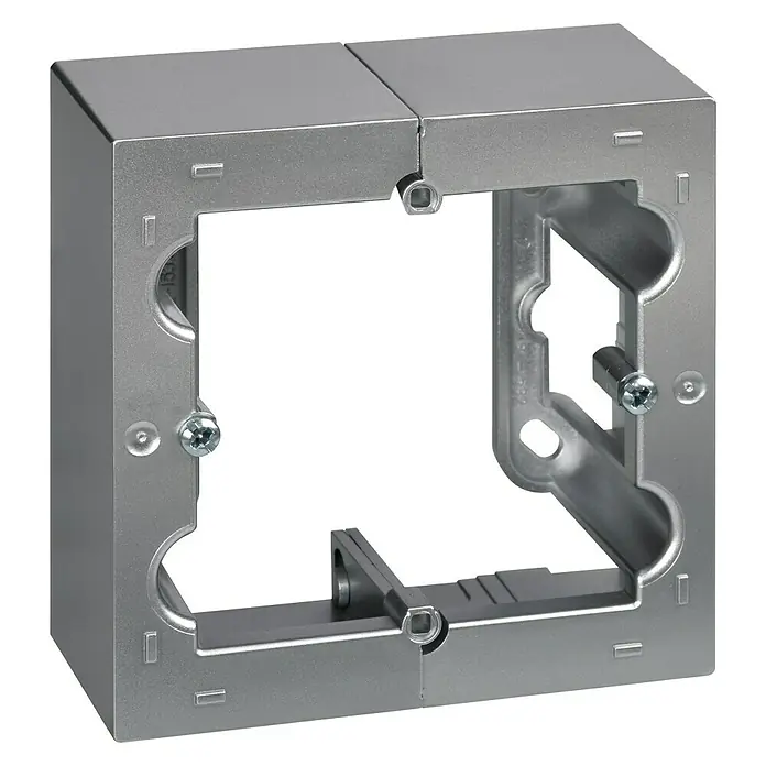 Simon 10 Caja de superficie - 4 x 8,4 x 8,4 cm, Colocar, Aluminio - Primer plano de una caja doble de dispositivo Legrand hecha de metal, ideal para la instalación eléctrica. Diseño robusto para una sujeción segura de interruptores y enchufes.
