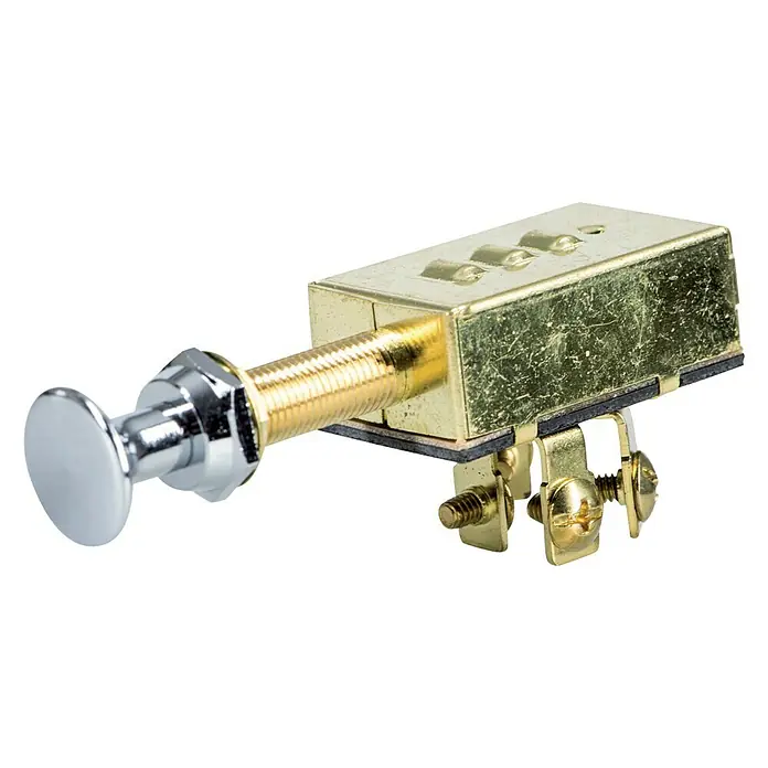 Talamex Einbau-Zugschalter - Polanzahl: 3 Stk., 12 V, 20 A - Nahaufnahme eines Zugschalters mit verchromtem Knopf und goldenem Gewindegehäuse, ideal für Oldtimer-Restaurierungen.