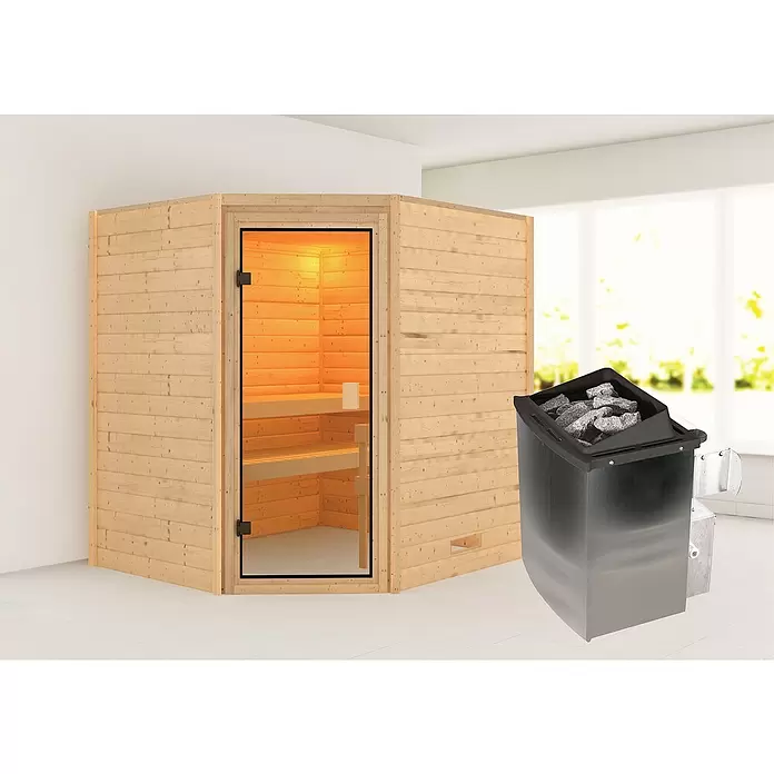 Karibu Massivholzsauna Kolmans - 9 kW Saunaofen mit integrierter Steuerung, L x B x H: 169 x 196 x 187 cm - Eine eckige Holzsaunakabine mit Glastür, begleitet von einem dunklen Elektro-Saunaofen mit Steinen.