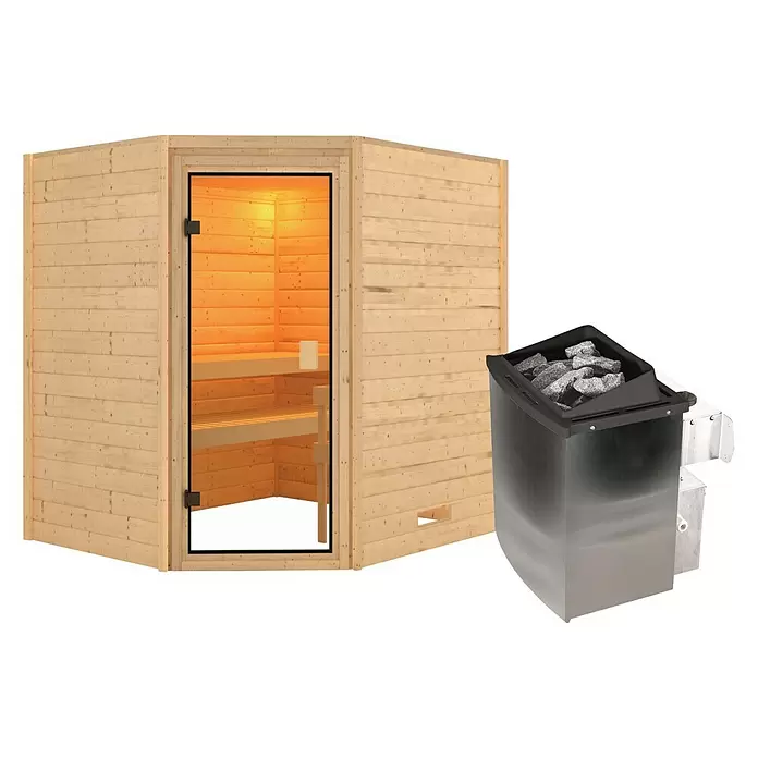 Karibu Massivholzsauna Kolmans - 9 kW Saunaofen mit integrierter Steuerung, L x B x H: 169 x 196 x 187 cm - Helle Holzsaunakabine mit Glastür, begleitet von einem separaten dunklen Metall-Saunaofen mit Steinen.