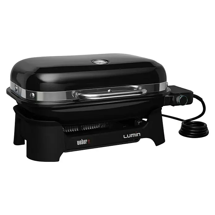 Weber Elektrogrill Lumin Compact - Grillfläche (B x T): 43 x 28 cm, 2.200 W, Schwarz - Das Bild zeigt einen schwarzen Weber Lumin Elektrogrill. Er verfügt über einen Temperaturregler und eine hochwertige Verarbeitung.
