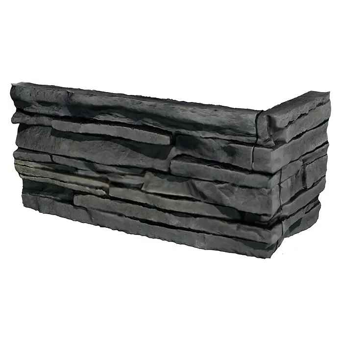 Stegu Verblendstein-Ecke Mesada - 26 cm x 12 cm x 24 mm, Graphit, Steinoptik - Das Bild zeigt eine graue Natursteinmauer in L-Form, die aus einzelnen, horizontal angeordneten Steinen besteht. Ideal für Garten oder Terrasse.