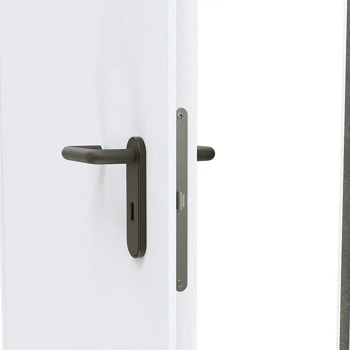Padilla ZK-Element Classic Plus - 87,5 x 200 cm, DIN Anschlag: Links, Verkehrsweiß - Nahaufnahme einer Tür mit modernem Türgriff und Schloss. Elegantes Design für ein stilvolles Zuhause.