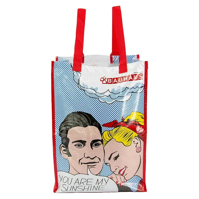 Fahrradtasche BAUHAUS YOU ARE MY SUNSHINE - Bunt, Traglast: 15 kg, 30 l - Einkaufstasche mit Pop-Art-Design und rotem Griff, die den Slogan „You are my Sunshine“ zeigt.