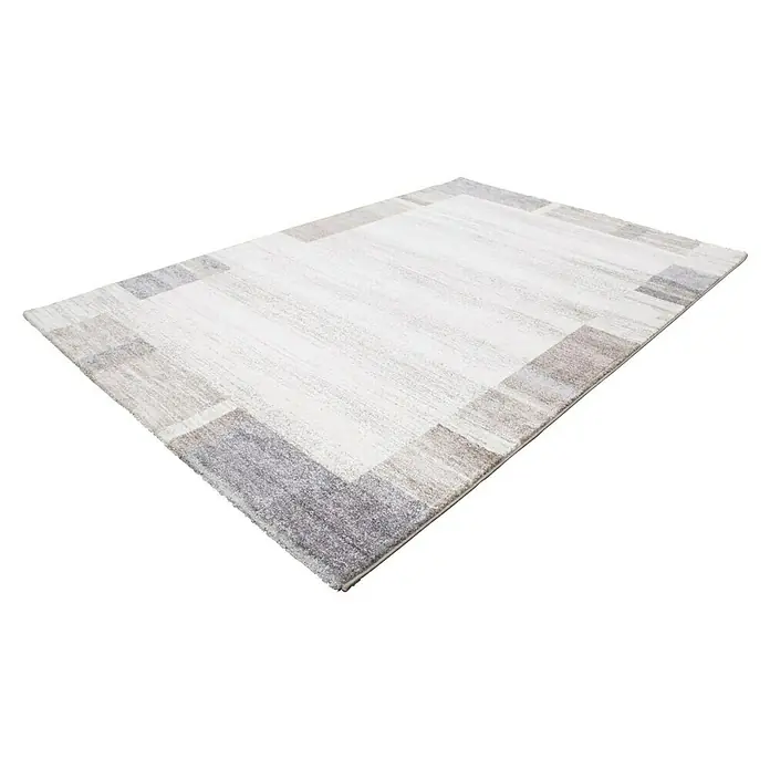 Kurzflorteppich Feeling 500 - Beige/Silber, 170 x 120 cm, 100 % Polypropylen (Flor) - Ein rechteckiger Teppich mit einem hellen, rechteckigen Mittelteil und einem geometrischen Randmuster in Grautönen.