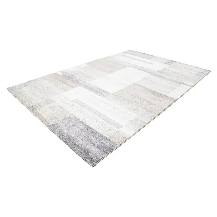 Kurzflorteppich Feeling 501 - Beige/Silber, 230 x 160 cm, 100 % Polypropylen (Flor) - Ein rechteckiger, mehrfarbiger Teppich mit einem geometrischen Muster aus Grau- und Weißtönen. Der Teppich hat eine strukturierte Oberfläche und Fransen an einem Ende.