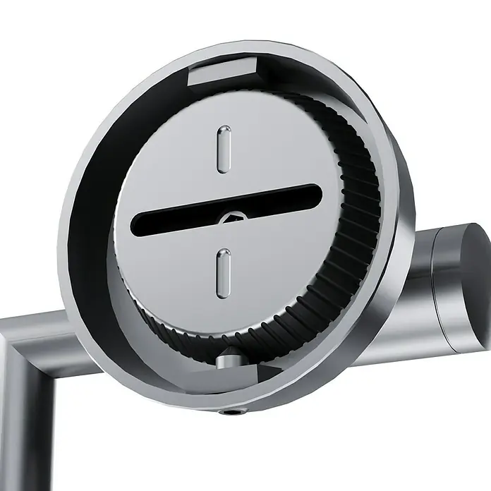 Camargue Paris Toilettenpapierhalter - Ohne Deckel, Edelstahl, Gebürstet - Nahaufnahme eines runden, silberfarbenen mechanischen Bauteils mit Schlitzen und Zahnrad, das an einem Rohr befestigt ist.