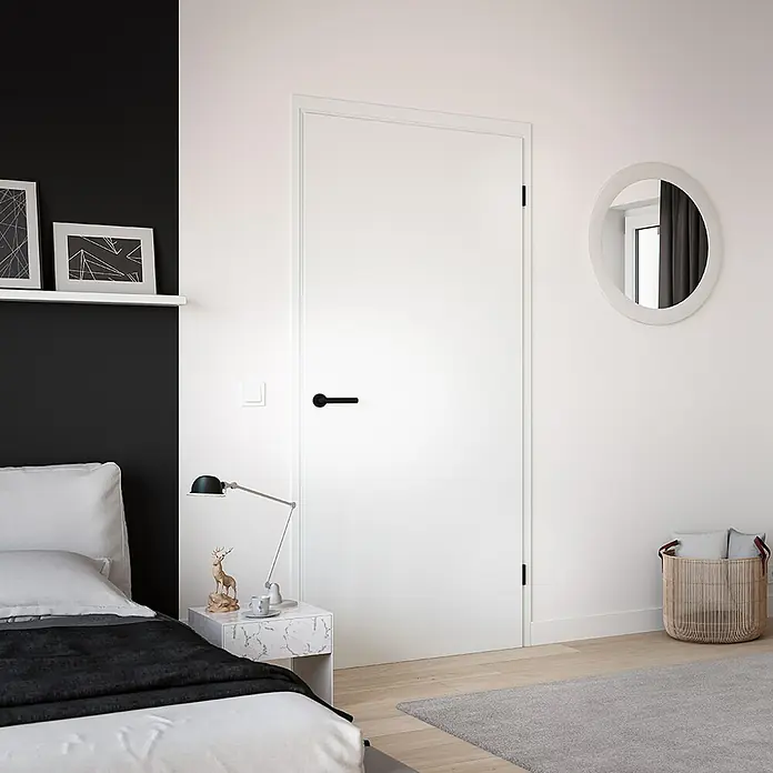Diamond Doors Zimmertürgarnitur Moderna Smart2lock - Stärke Tür: 38 mm - 45 mm, Edelstahl, L-Form, Graphitschwarz, DIN Anschlag: Rechts, Passend für: Türen ohne Schlüssellochbohrung, Türen mit Schlüssellochbohrung benötigen zusätzlich eine Blindrosette - Das Bild zeigt eine moderne weiße Tür mit schwarzem Griff in einem stilvollen Schlafzimmer. Die Tür ist schlicht und elegant gestaltet.