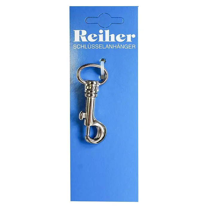 Reiher Schlüsselanhänger - Länge: 60 mm, Vernickelt - Nahaufnahme eines Reiher Schlüsselanhängers mit Karabinerverschluss auf blauem Karton.