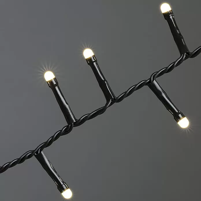 Konstsmide LED-Lichterkette Micro Compact - 11,78 m, Anzahl Leuchtmittel: 400 Stk., Netzbetrieben, 6 W - Warmweiße LED-Lichterkette mit schwarzem, verdrilltem Kabel, leuchtend.