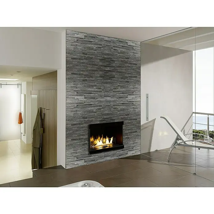 Verblendstein Nature - 15 x 60 cm, Schwarz, Steinoptik - Elegantes Interieur mit einem modernen Kamin mit Steinverkleidung, der Wärme und Stil in den Raum bringt. Eine luxuriöse Entspannungsoase.