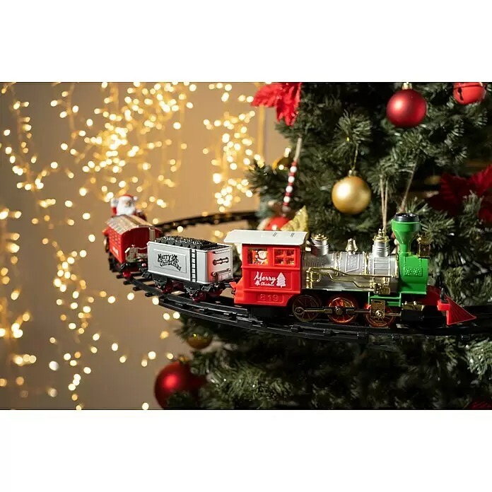 Elemento decorativo Tren LED - Colores surtidos, Plástico, 1 ud. - Tren de Navidad de plástico colorido, rojo, verde y plateado, sobre vías alrededor de un árbol de Navidad con luces festivas.