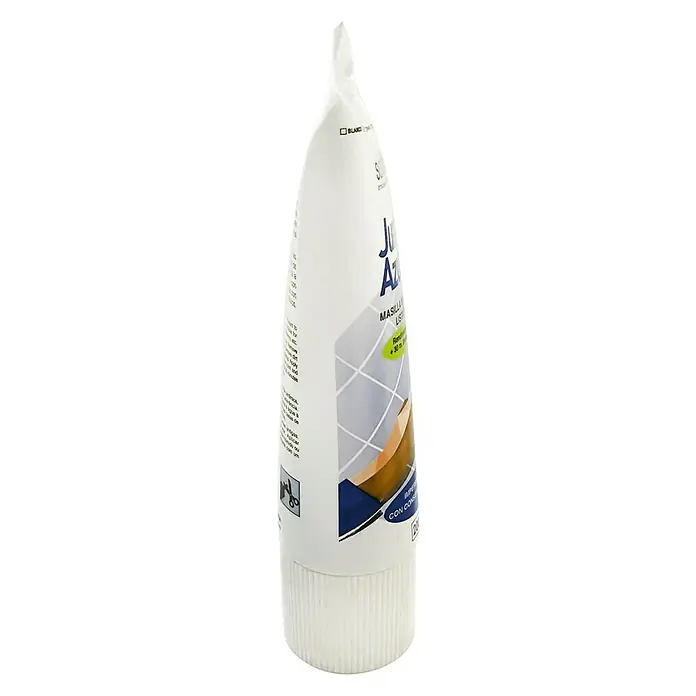 Masilla Juntas de Azulejos - Blanco, 200 ml - Primer plano de un tubo de adhesivo de construcción Junta Azul, ideal para unir diversos materiales en interiores y exteriores.
