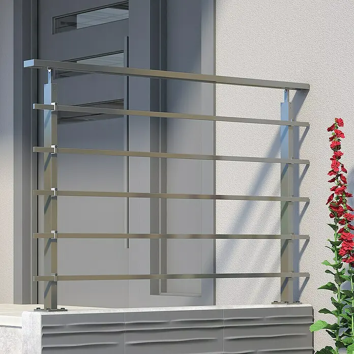 Dolle Geländer-Set PS 300 - Oberbodenmontage, Aluminium, Dark Grey, Eckig, Länge: 150 cm - Detailaufnahme eines modernen Edelstahlgeländers vor einer weißen Wand, ergänzt durch eine blühende rote Pflanze.