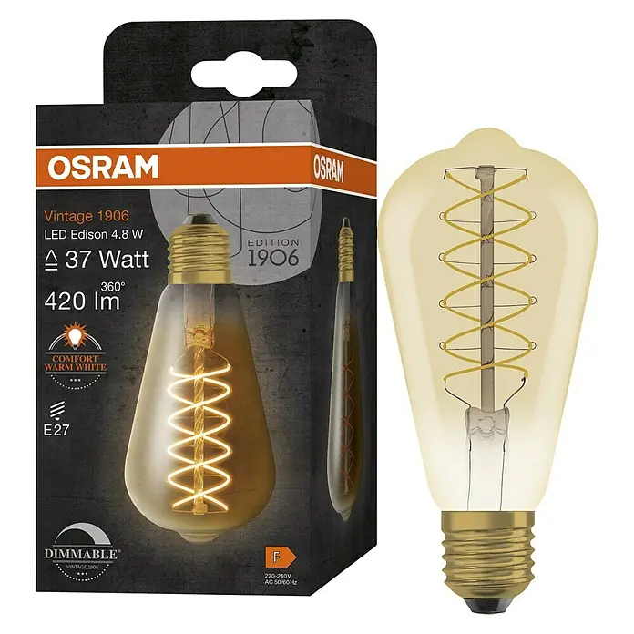 Osram LED-Lampe Vintage Edition 1906 Birnenform E27 - E27, Dimmbar, Warmweiß, 420 lm, 4,8 W, Gold - Eine OSRAM Vintage 1906 LED Edison Lampe mit 4,8 W, die ein warmweißes Licht abgibt und dimmbar ist, im Vordergrund, Verpackung im Hintergrund.