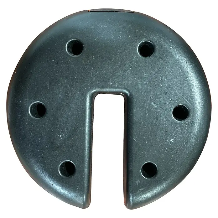 Base de parasol - Ø x Al: 20 x 4,5 cm, Específico para: Tubos cuadrados de 20 x 20 mm y 30 x 30 mm, 4 pzs., Polietileno - Primer plano de una base redonda negra para sombrilla de patio con múltiples orificios y un recorte en forma de U.