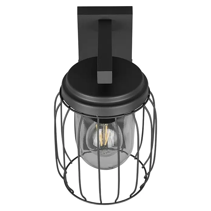 Trio Leuchten Sensor-Außenleuchte TUELA - 40 W, L x B x H: 23,5 x 16,5 x 28 cm, Grau, IP44 - Nahaufnahme einer schwarzen Wandleuchte im Industriedesign mit einem klaren Glaskolben und einem filigranen Metallkäfig.
