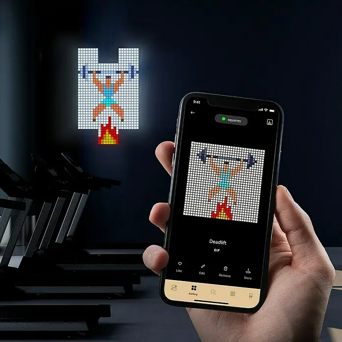 Twinkly LED-Panel-Set Squares RGB StartersetRGB - Pixel-Kunst-Display mit einer Deadlift-Darstellung, gesteuert über eine Smartphone-App, die das Design auf einem LED-Raster zeigt.