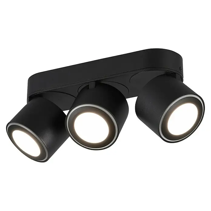 Trio Leuchten LED-Deckenstrahler Taurus - 15 W, Schwarz, Warmweiß, 3 Stk. - Nahaufnahme einer schwarzen LED-Deckenleuchte mit drei Strahlern, die ein helles, fokussiertes Licht ausstrahlen und eine moderne Beleuchtungslösung bieten.