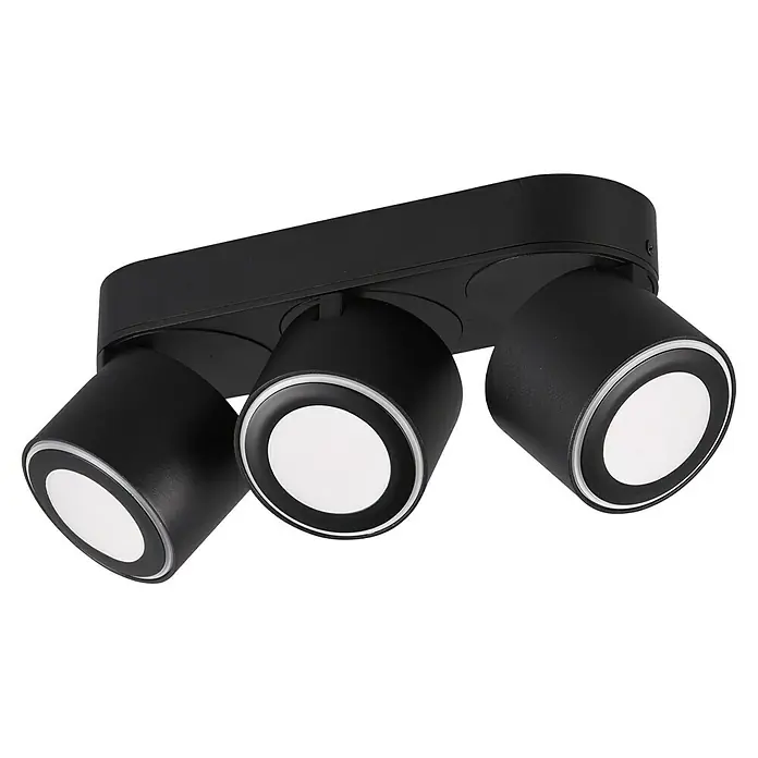 Trio Leuchten LED-Deckenstrahler Taurus - 15 W, Schwarz, Warmweiß, 3 Stk. - Nahaufnahme einer schwarzen Deckenleuchte mit drei Strahlern, die auf einem schwarzen Hintergrund platziert ist. Das Design ist modern und minimalistisch.