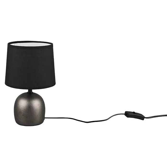 Trio Lighting Lámpara de sobremesa redonda Malu - 40 W, Ø x Al: 16 cm x 26 mm, Níquel antiguo, Negro, E14 - Elegante lámpara de mesa con pantalla negra y base color bronce. La lámpara emite una luz cálida y suave, ideal para cualquier estancia.