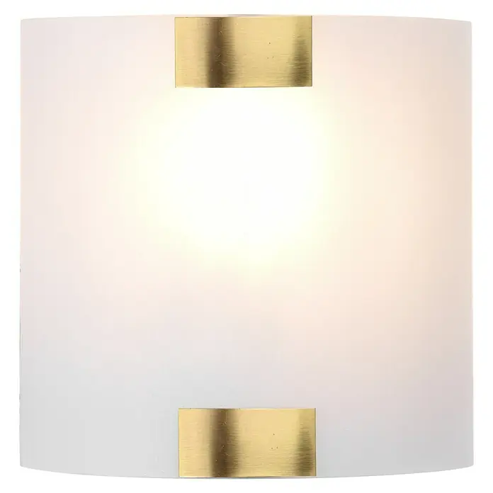Trio Lighting Aplique de pared Pura - 25 W, L x An x Al: 7,5 x 20 x 20 cm, Dorado, E27 - Primer plano de un elegante aplique de pared, con una pantalla cilíndrica y detalles dorados decorativos, creando un ambiente cálido.