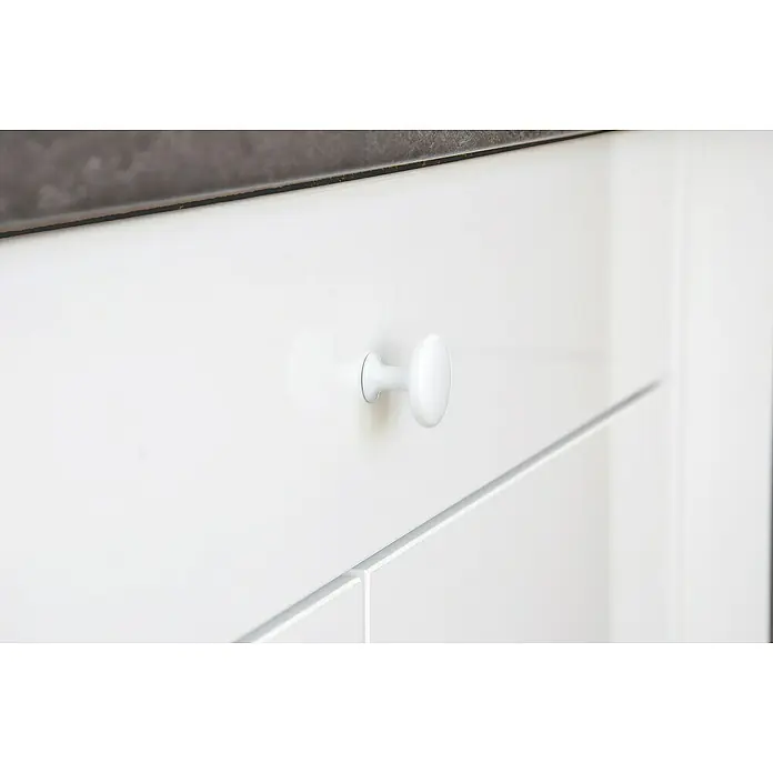 Siro Möbelknopf - Typ Möbelgriff: Knopf, Ø x H: 30 x 24 mm, Stahl, Weiß - Nahaufnahme eines weißen Schranks mit einem runden Griff, der ein minimalistisches und modernes Design betont.