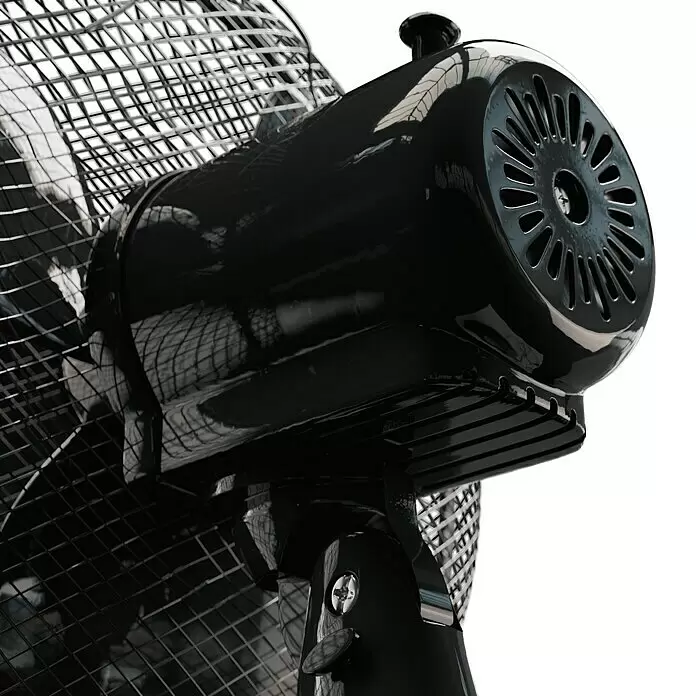 Voltomat Tischventilator - Schwarz, 30 cm - Nahaufnahme des glänzenden schwarzen Motorgehäuses und Schutzgitters eines elektrischen Ventilators.