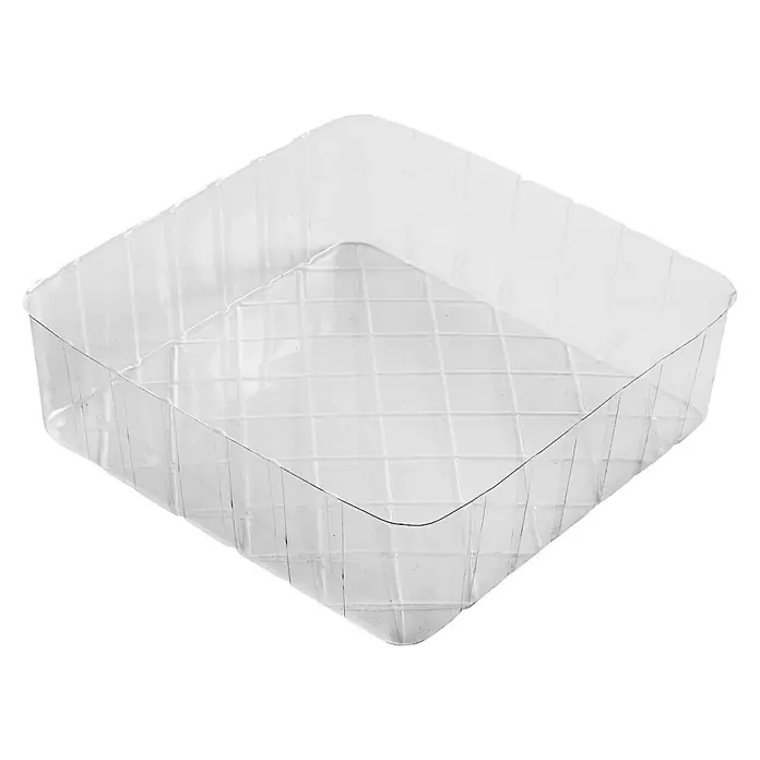 Versa Paragüero Gotas - L x An x Al: 15,5 x 15,5 x 49 cm, Blanco - Un recipiente de plástico transparente y cuadrado con fondo cuadriculado, sobre un fondo negro.