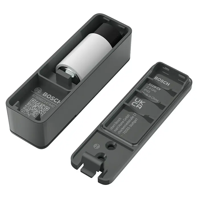 Bosch Smart Home Funk-Fensterkontakt II Plus - Anthrazit, Batteriebetrieben, 23 x 22 x 75 mm, 1 Stk. - Offene Bosch Smart Home Gerätekomponenten mit Batterie und technischen Details auf der Innenseite des Gehäuses.