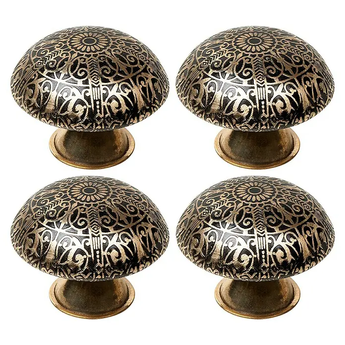 Möbelknopf-Set - 4 Stk., Typ Möbelgriff: Knopf, Ø x H: 37 x 28 mm, Vergoldet - Nahaufnahme von vier dekorativen, schwarzen und goldenen Möbelknöpfen mit floralen und kurvigen Mustern.