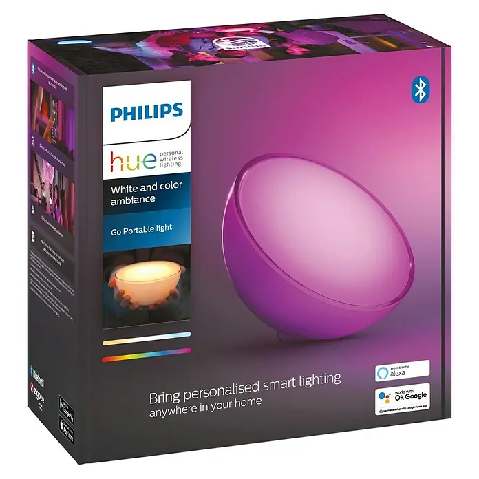 Philips Hue LED-Tischleuchte Go - 6 W, L x B x H: 15 x 15 x 7,9 cm, RGBW - Ein Philips Hue Go Portable Light Paket mit der Aufschrift "White and color ambiance" ist abgebildet.