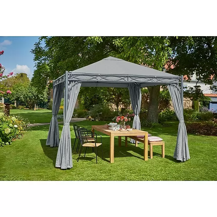 Sunfun Menorca Seitenteil - Grau - Grauer Gartenpavillon mit Metallrahmen und Vorhängen, schützt eine hölzerne Essgruppe auf sonnigem Rasen.