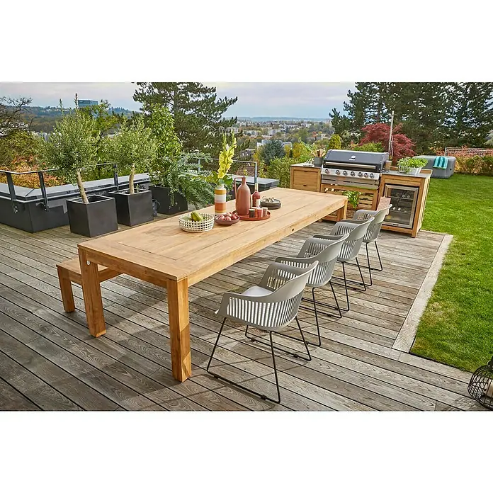 Sunfun Zoe Módulo de cocina exterior Armario con cajones - Marrón, An x Pr x Al: 58 x 63 x 92 cm, Madera de teca - Acogedor espacio al aire libre con una larga mesa de madera rodeada de sillas modernas, perfecto para comer al aire libre.