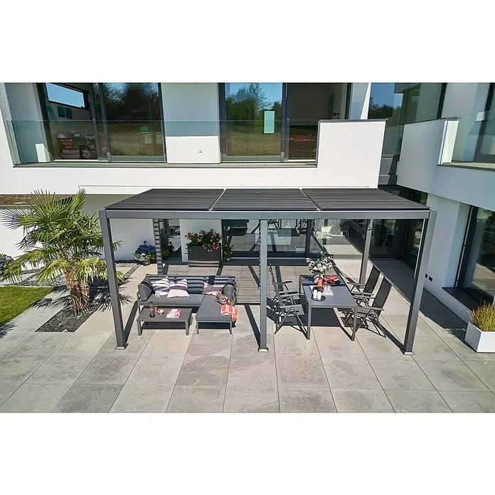 Sunfun Cannes Pergola - B x T: 540 x 300 cm, Farbe Gestell: Anthrazit, Aluminium - Gemütliche Terrasse mit einer modernen Pergola, stilvollen Gartenmöbeln und üppiger Bepflanzung, die zum Verweilen einlädt.